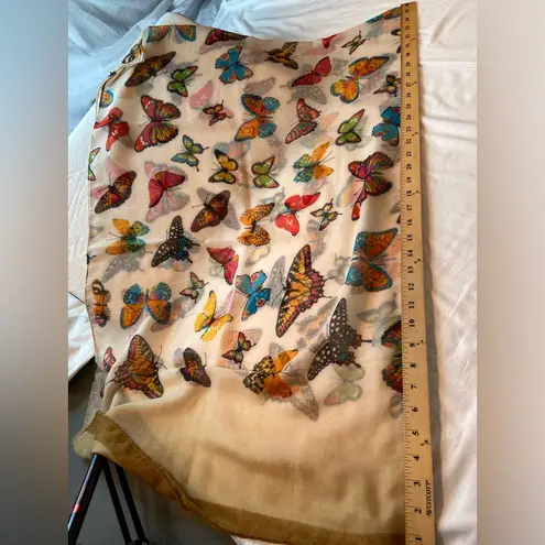 Scarf with Butterfly’s roaming! Feels like cotton blend. Sheer. Lightweight
