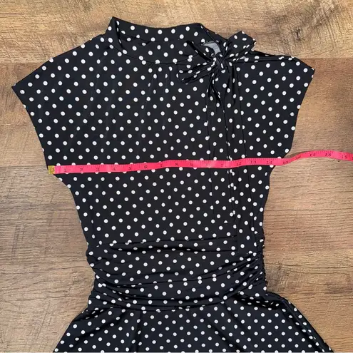 Retrolicious Black and White Polka Dot Midi Dress with Bow Detail at Neckline