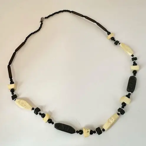 Black and tan long beaded necklace