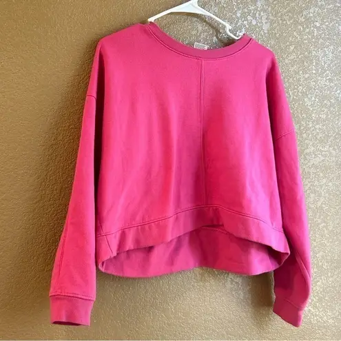 All In Motion  Lot-two cropped sweatshirts in size xs in both teal and hot pink