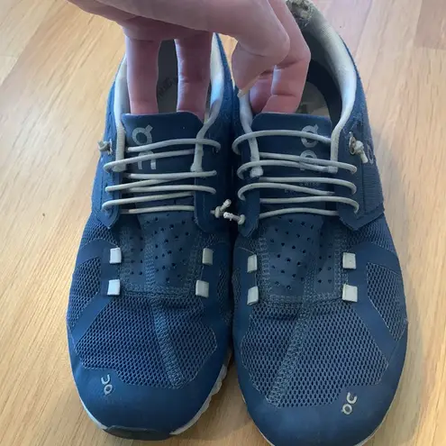 on cloud running sneakers in royal blue