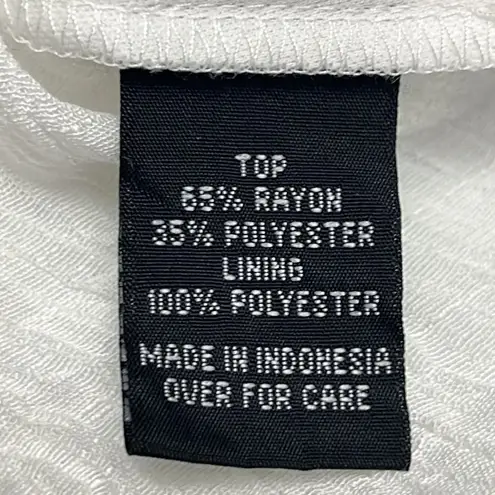 AGB Cream Crepe Sleeveless Beaded Neckline V