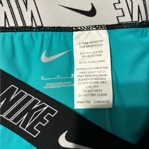 Nike NWT  Women Fusion Logo Tape Kickshort medium