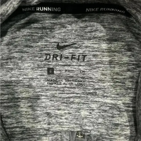 Nike  grey athletic jacket in size small