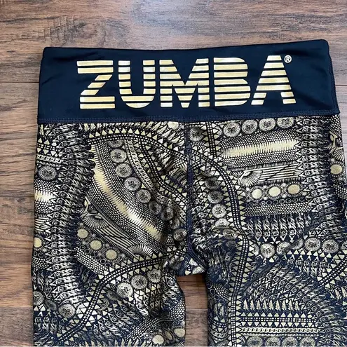 Zumba • All Night Metallic Capri Leggings cropped gold foil medallion print