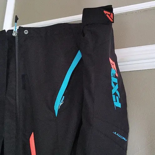 FXR Women's Ski & Snow Jacket in Black with Blue and Orange Accents Size 6