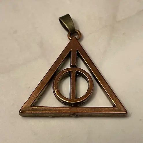 Harry Potter Deathly Hallows Spinning Pendant Bronze Toned Brown