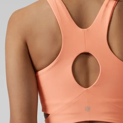 Athleta  Bright Peach Conscious Crop Cut Out Bra A-C