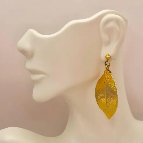 Gold tone leaf post earrings