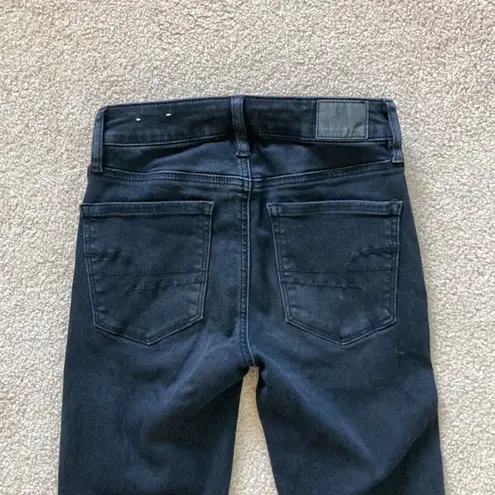 American Eagle  high rise distressed black jegging jeans in size 00