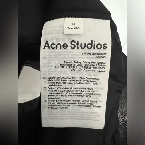 Acne Studios Low Rise Paneled 100% Leather Miniskirt In 900 Black