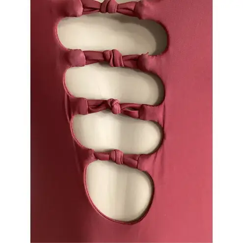 Becca New. knotted one piece. Size medium. Retails $129