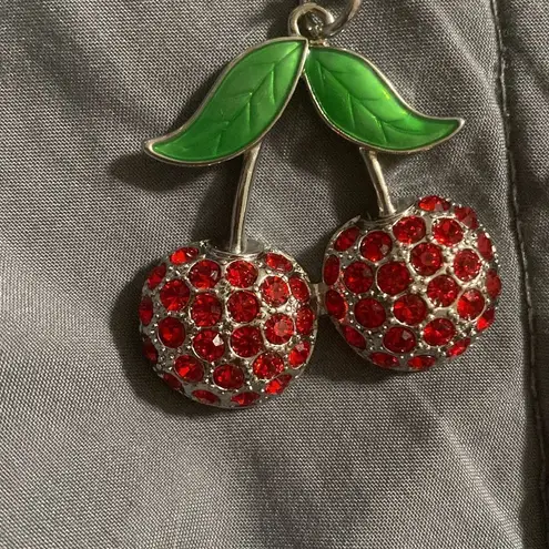 Cherry necklace in heart case , pair your items up with jeans , dresses, skirts Red