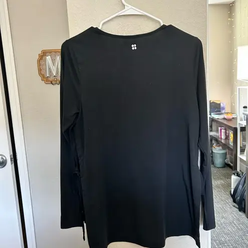 Sweaty Betty  | Tie Side Yoga Long Sleeve Top in black size 4-6