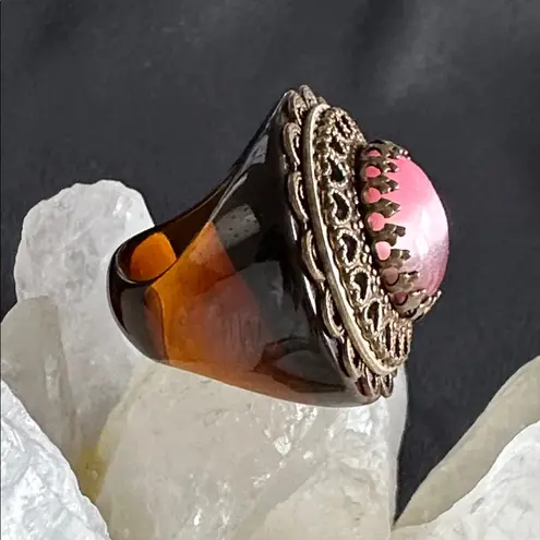 Unique resin & goldtone filigree EUC ring. Imitation pink cat’s eye center stone