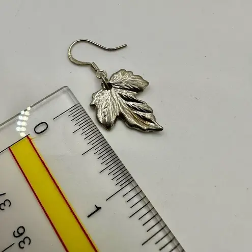Silver tone maple leaf earrings
