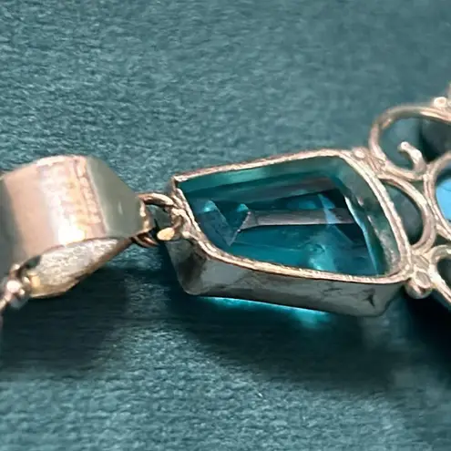 Sterling Silver Turquoise Colored Howlite with Topaz and Aqua Accent Pendant Blue