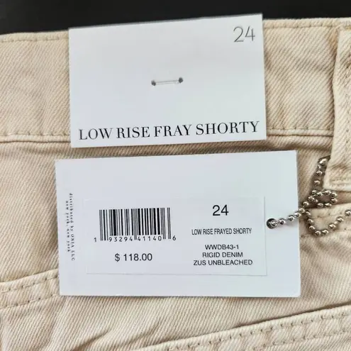 We Wore What Cream Denim Cut Off Shorts NWT Size 24 Natural Revolve jean shorts