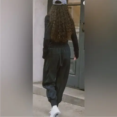 NWOT FP Movement by Free People Make It Count Onesie Black