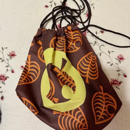 Animal Crossing Drawstring Backpack Bag Brown Leaf Print Nintendo - Image 1