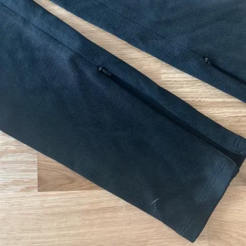 Area black asymmetrical jumpsuit with crystal embellishment