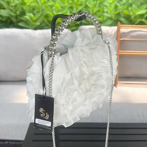 Sincerely Jules, silver rhinestone and white ruffled satchel