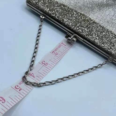 Vintage mid century silver foil clutch with silver cut stones .