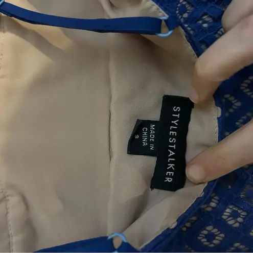 Stylestalker Blue Lani mini dress. Blue lace tan lined deep V spaghetti strap