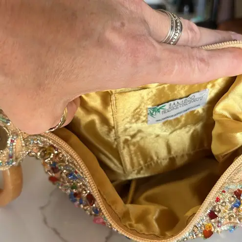 Sand Blossom Wristlet Bag Retailed for 98.00 Gold