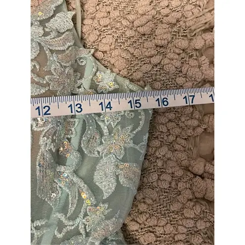 Ellie Wilde Mon Cheri Prom Dress. Size 6. Sea foam Green w/opalescent sequins.