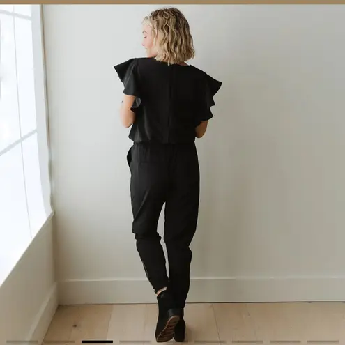 Albion Fit Nine To Nine Ruffle Sleeve Jumpsuit black size medium