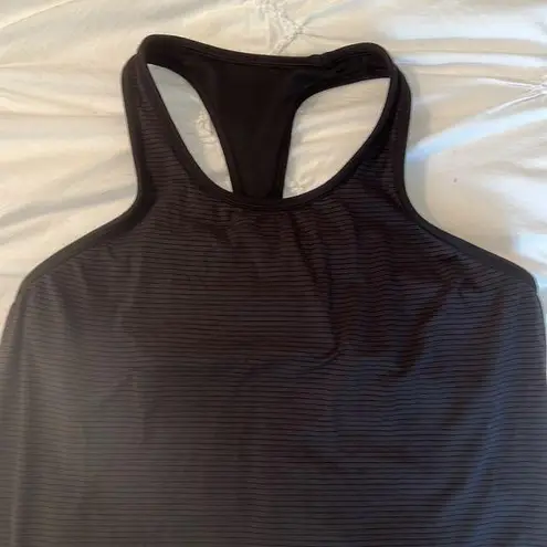 Lululemon Lululemmon black racerback tank top. Built in bra. Ruched back. Size 6