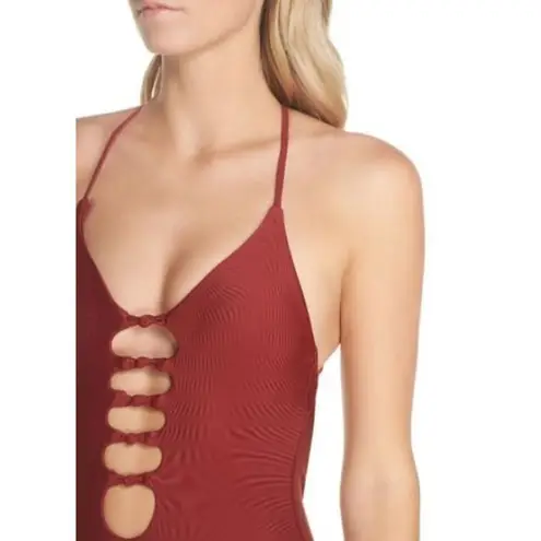 Becca New. knotted one piece. Size medium. Retails $129