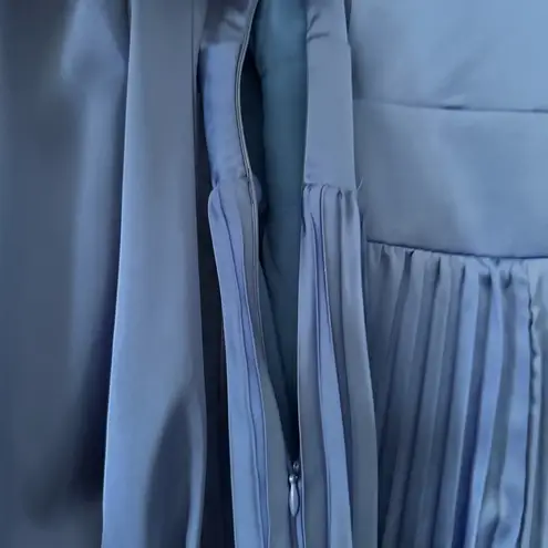 Joy Joy Blue boutique mini dress with pleated skirt and twist front v-neck. Size XS.