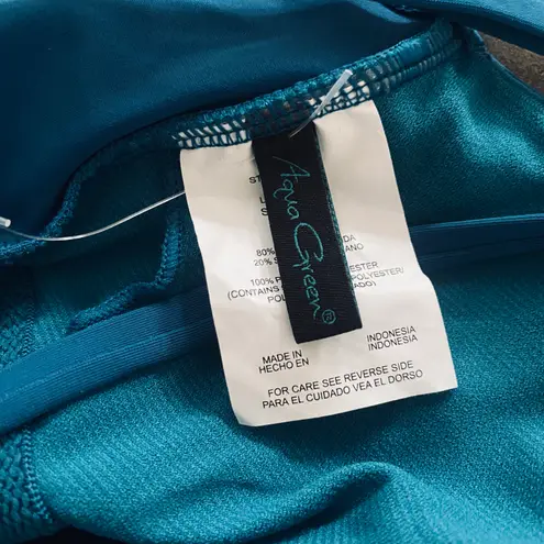 Aqua Green women's UPF 50 Double strap Asymmetrical one piece swimsuit.