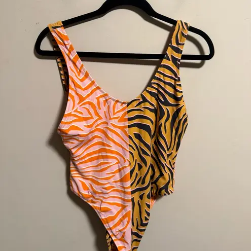 It’s Now Cool x Free People Tiger Print One Piece Swimsuit
