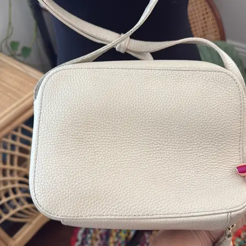 Cuyana Cream Pebbled Leather Tassel Zip Crossbody Camera Bag