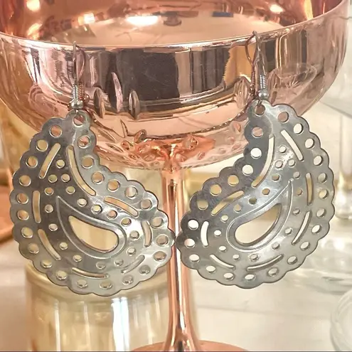 Silver tone paisley statement earrings