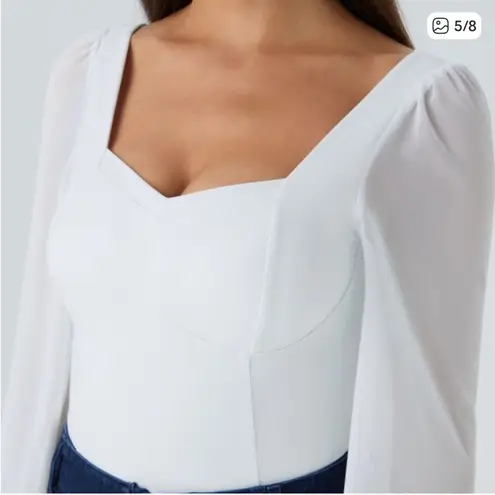 Halara SoftlyZero White Mesh Sleeve Bodysuit size M.