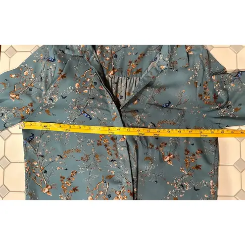 Likely a Medium Teal hidden button Down shirt w. Birds Butterflies & Foliage