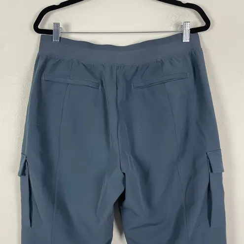 Athleta  Endless High Rise Cargo Pants Women Size 14 Blue Zip Pockets Activewear