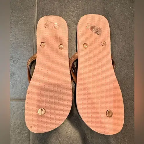 Havaianas  rose gold flip flops size 11/12