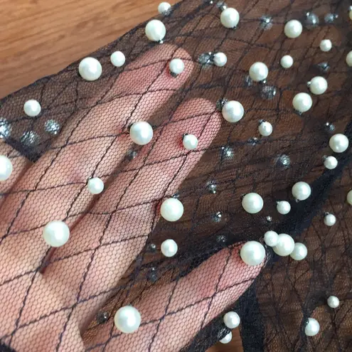 See through faux pearl top. Xs Black