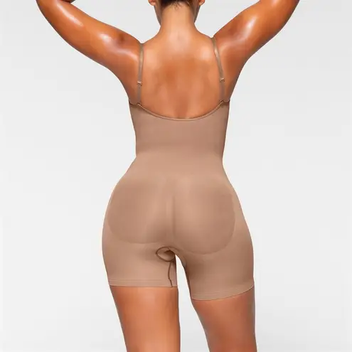 SKIMS Seamless Sculpt Mid Thigh Bodysuit in Sienna