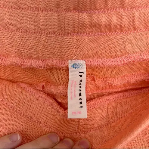 Free People  Movement Back Into It Neon Peach Jogger Pants