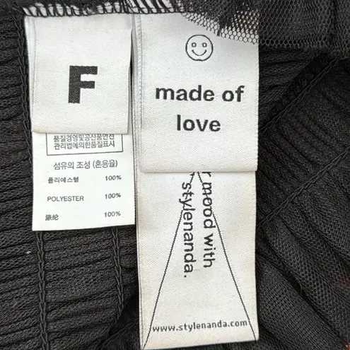 Stylenanda Korea Black Ruffled Hem Smocked Strapless Tube Top Size undefined