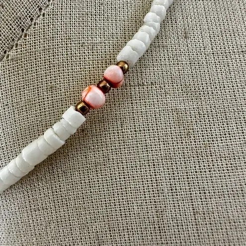 Shell and pink beaded puka necklace