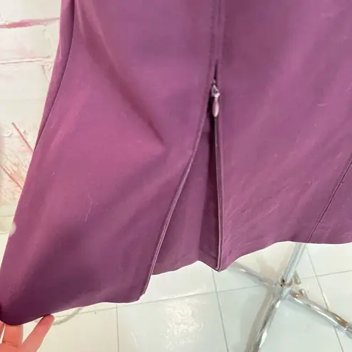 Carlisle New York sleeveless purple a line dress with zippers on pleats of hemli