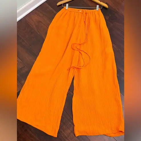 Faithfull the Brand Rupina Flare Leg Crinkle Pants Tangerine Size 4 NWT