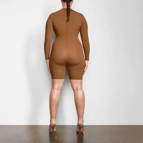 SKIMS NEW  All-In-One Long Sleeve Mid Thigh Onesie Bodysuit Caramel Large L NWT